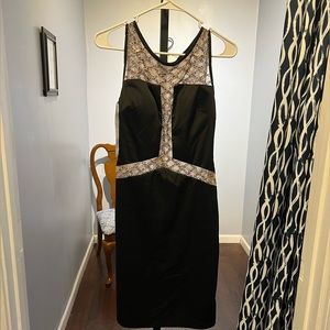 New Black fitted short formal dress with illusion beading. Size 6